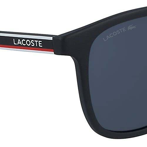 Close-up of Lacoste sunglasses with logo on the arm